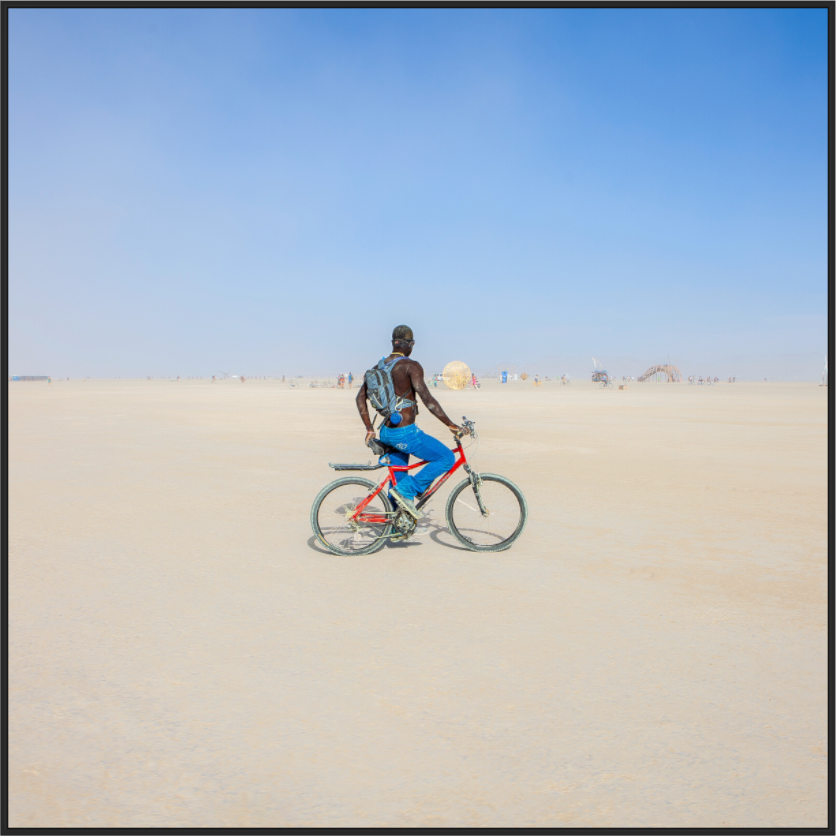 Main image Burning Man - Man on Red Bike