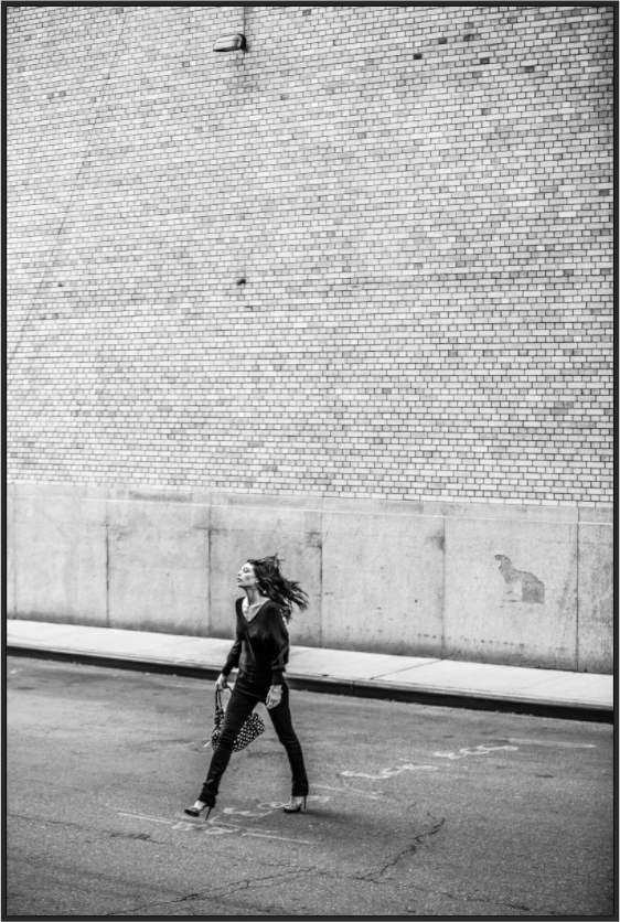 Woman Walking Across the Street