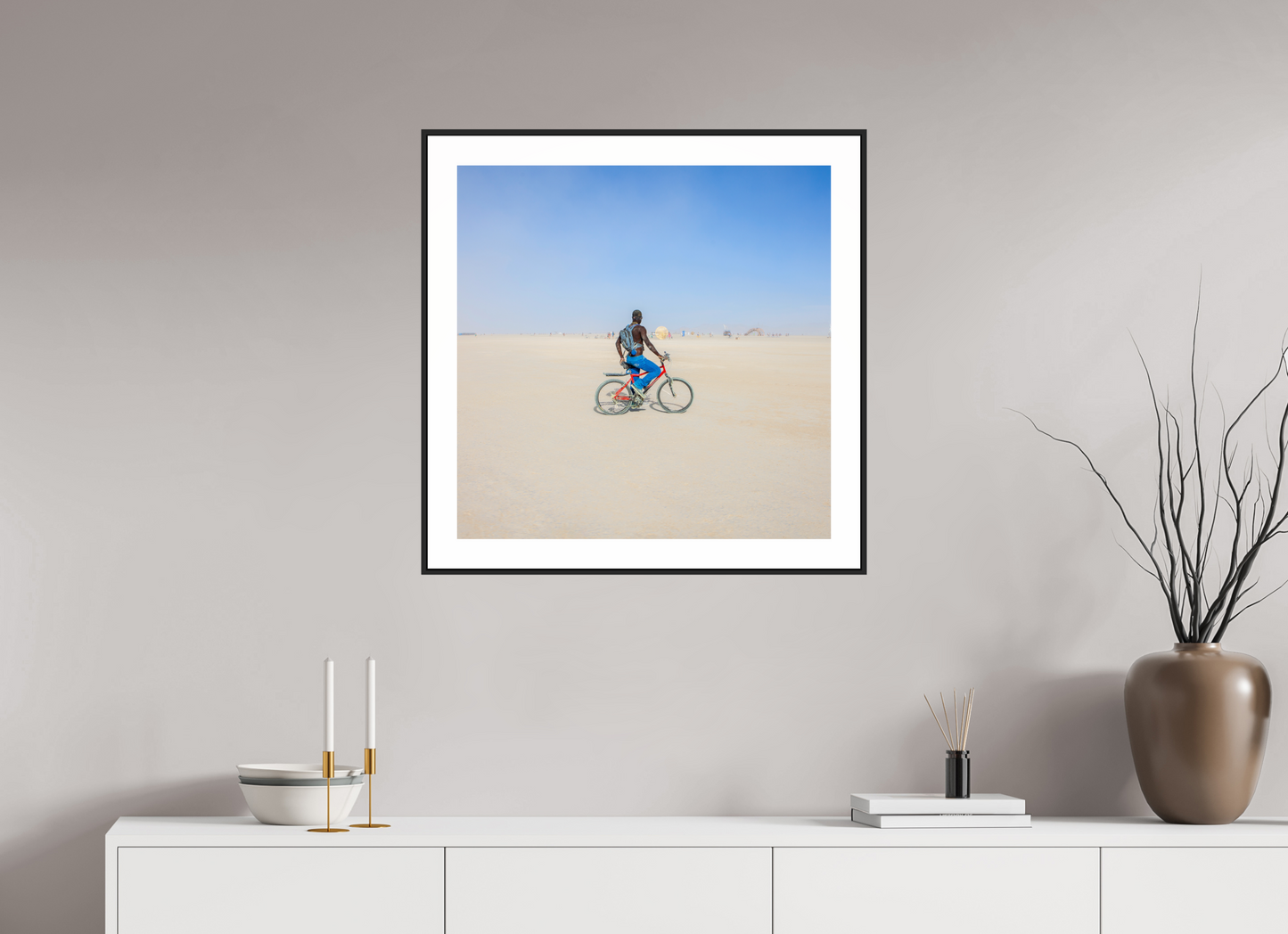 25 x 25″, Black Matte Frame Burning Man - Man on Red Bike