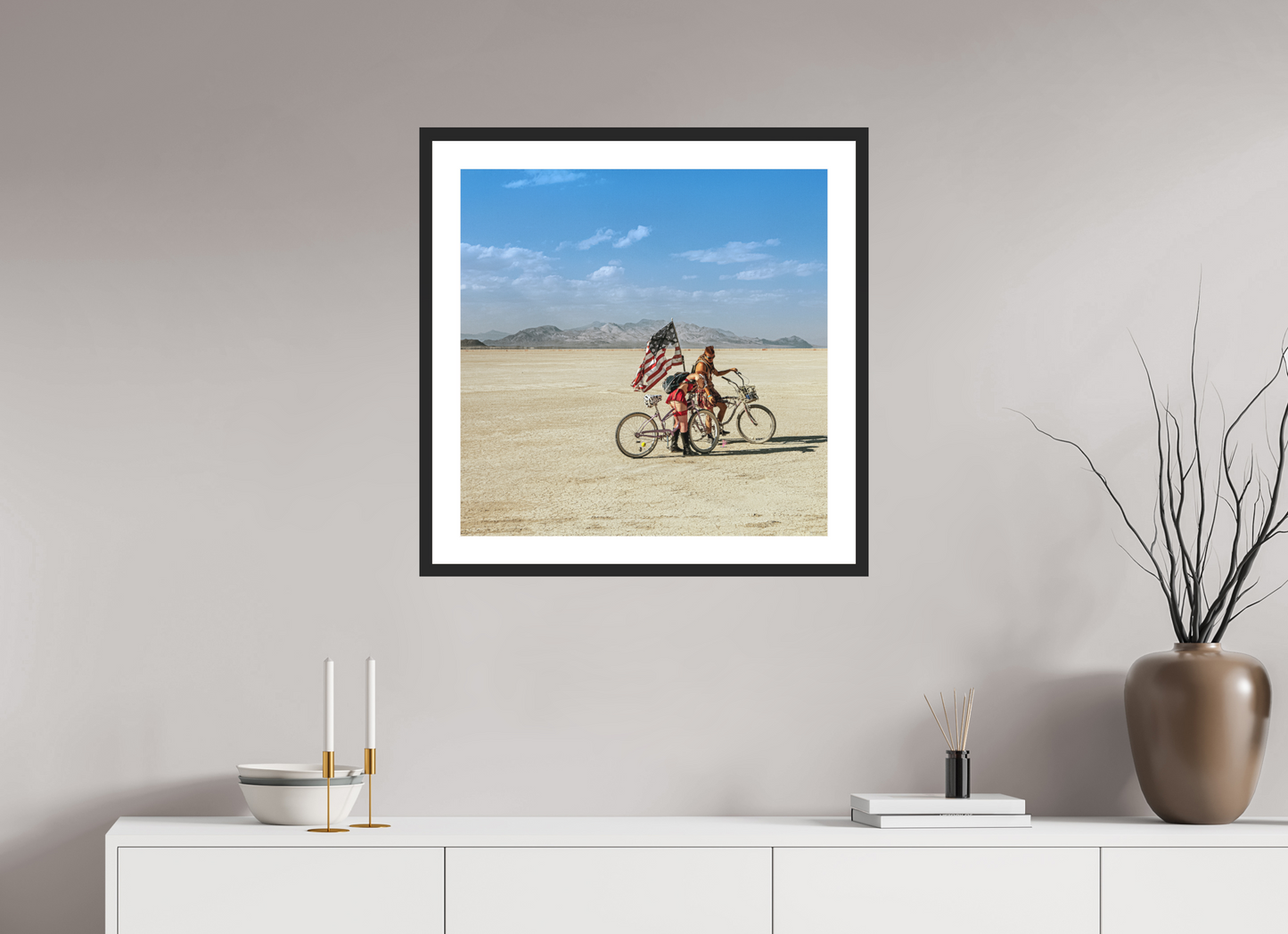 25 x 25″, Solid 0.8" Black Wood Frame With 2" Natural White Passe-Partout with Museum Glass Burning Man - Two with Bikes and USA Flag (square format)